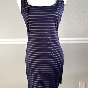 Jennifer Lopez at the knee dress. Tank top style with back cutout detail.